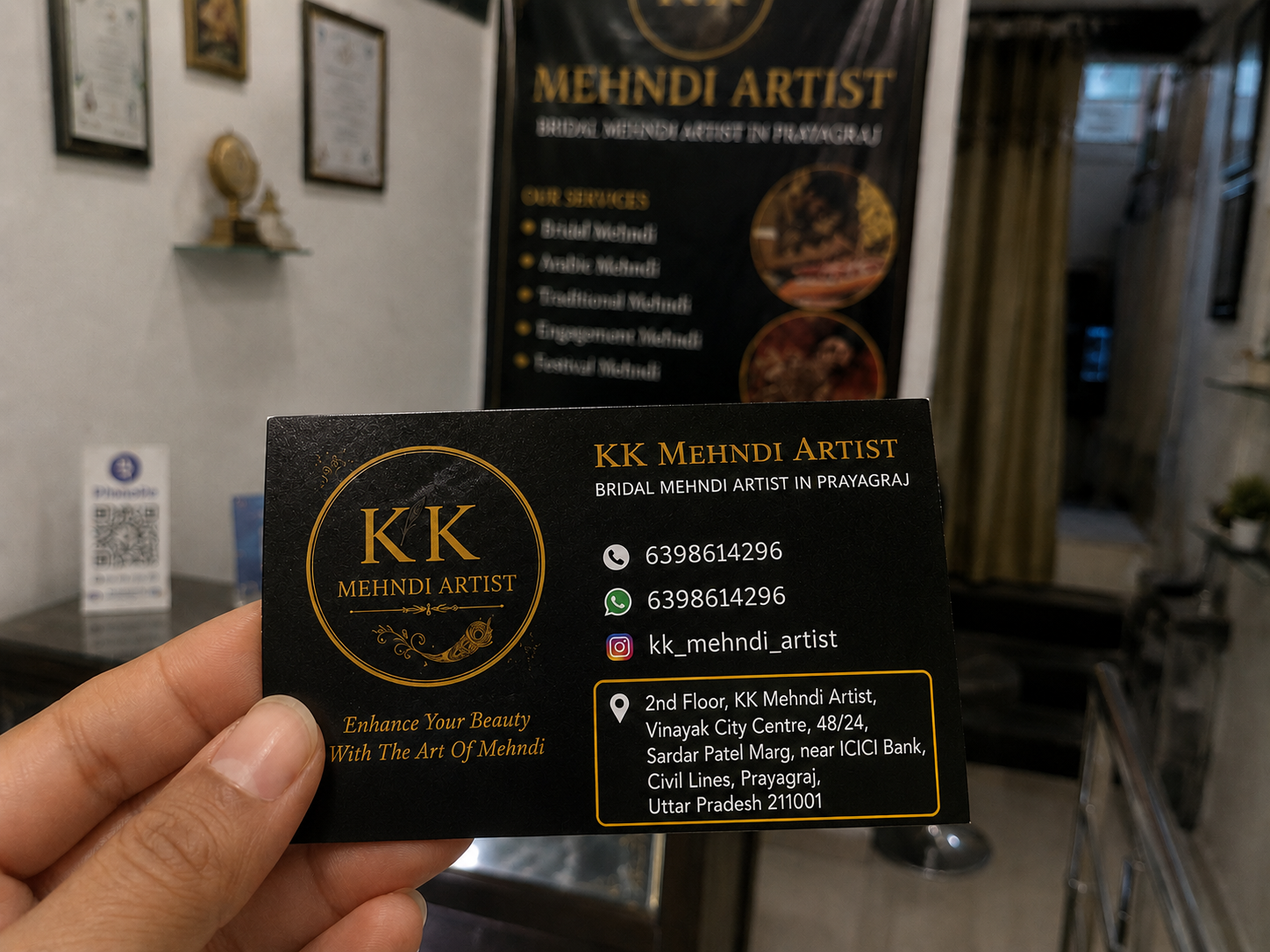 kk-mehndi-artist-business-card-hand-holding.jpg (1)
